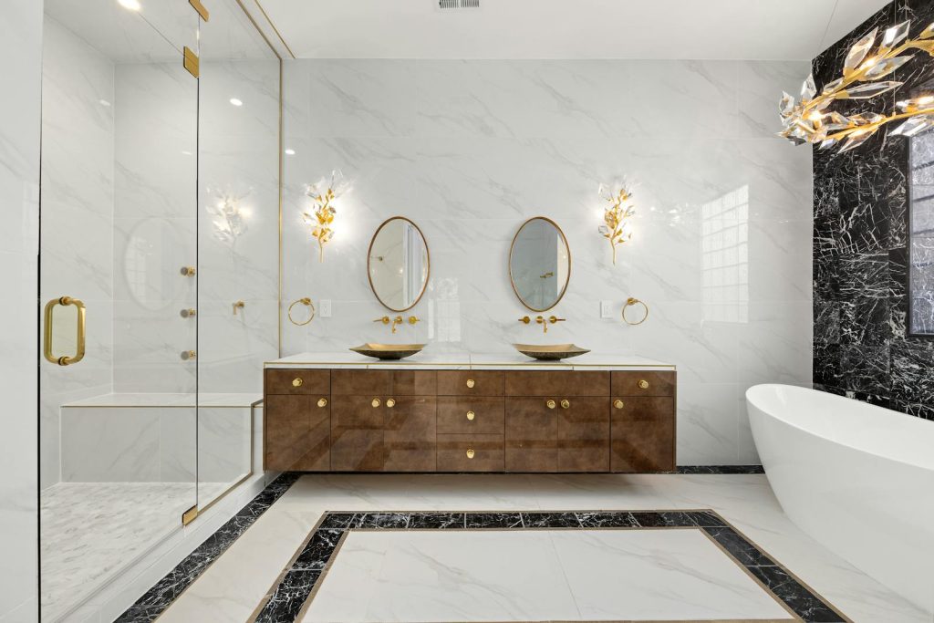 Elegant bathroom in Denver showcasing luxury marble and modern fixtures.