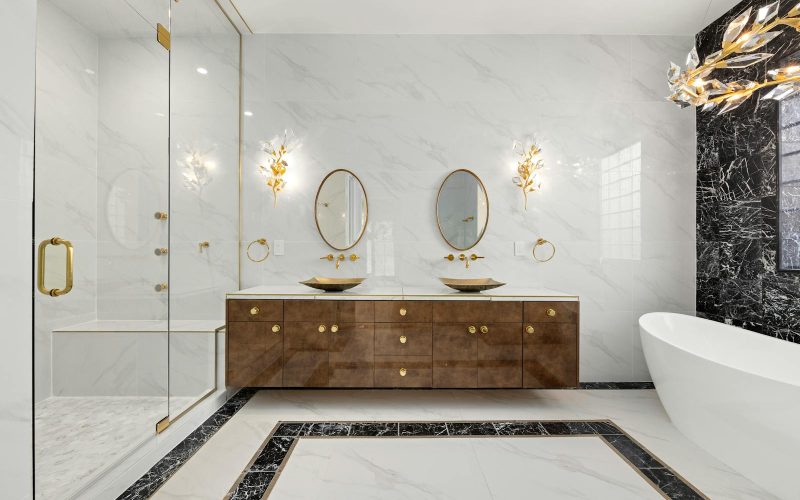 Elegant bathroom in Denver showcasing luxury marble and modern fixtures.